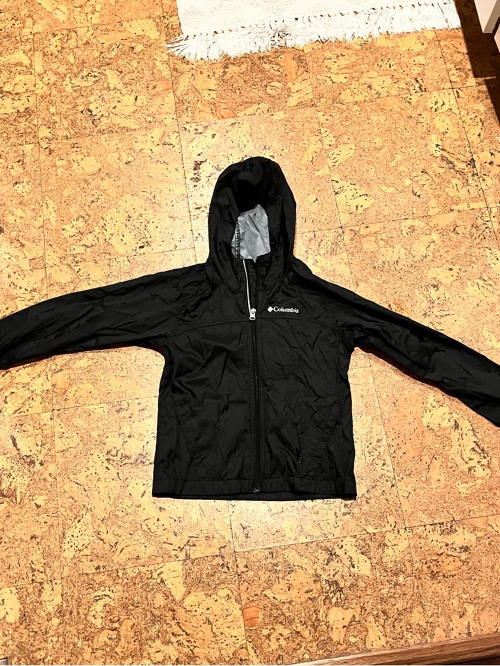 Columbia’s Kid’s Black Lightweight Rain Jacket (XS6-7)